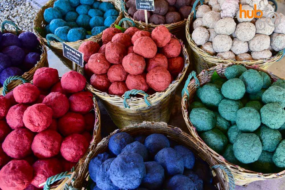 Coloured balls of elephant poo ready for the paper making process